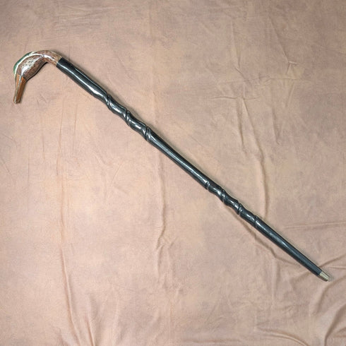 British vintage twisted black shaft walking stick with painted duckhead handle, 94cm